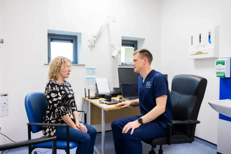 Clinician performing a musculoskeletal assessment with a patient at Northern Medical
